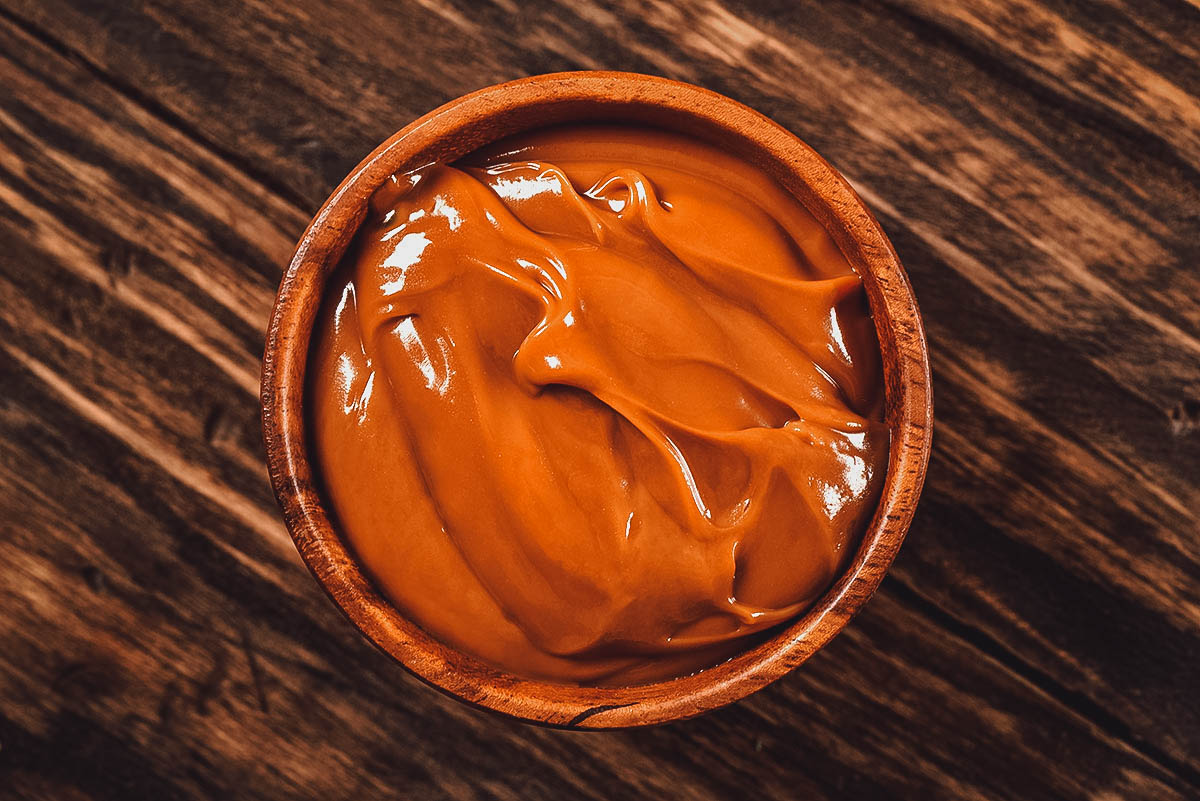 Bowl of dulce de leche, a popular spread or filling in Argentinian cuisine