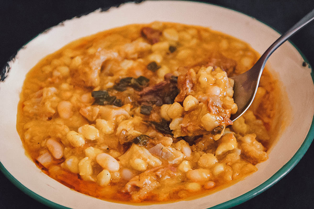 Bowl of locro with white corn, an Argentinian national dish