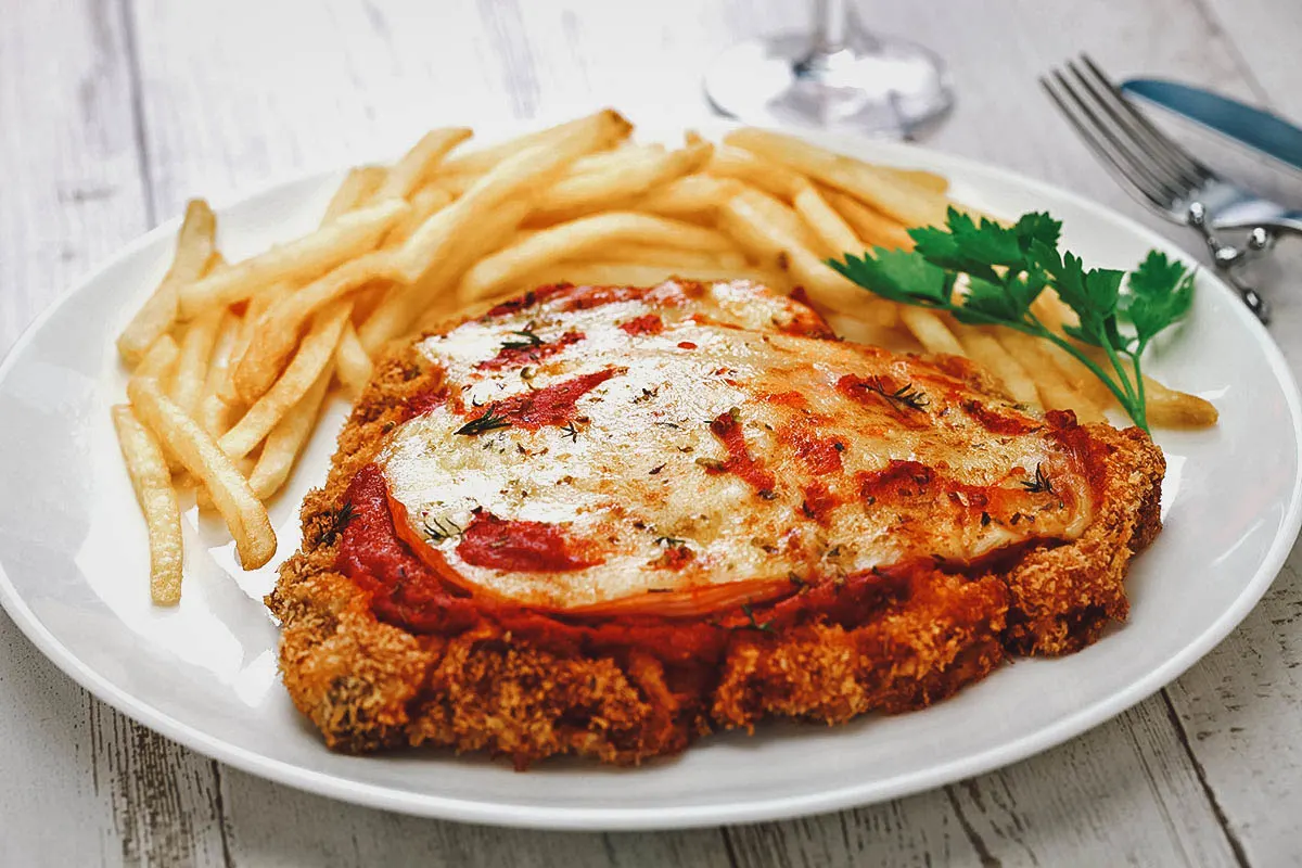 Argentinian Food Milanesa with french fries, an Argentinian national dish