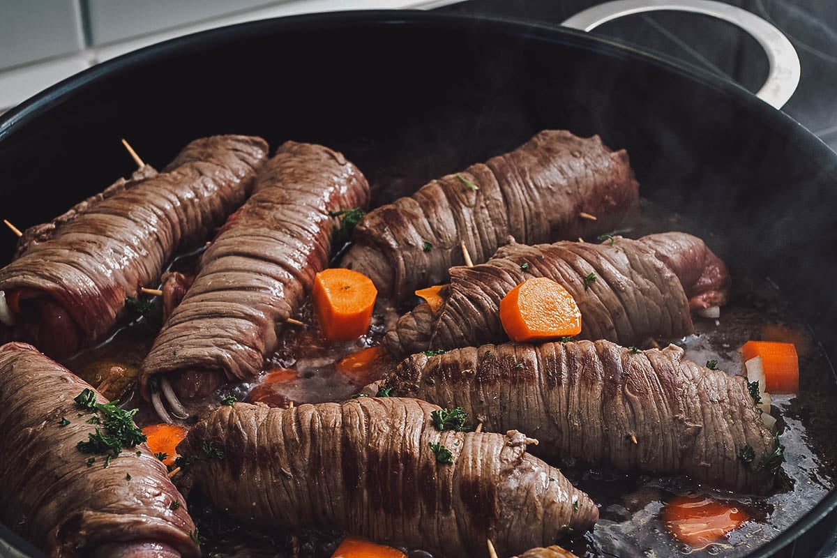 Cooking bragioli, a type of Maltese beef roll