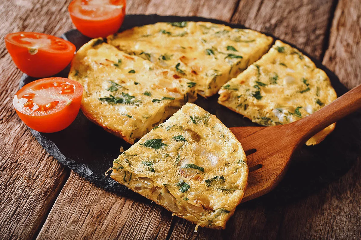 Egyptian Food Eggah with leeks, tomatoes, and fried onions – the Egyptian version of a frittata