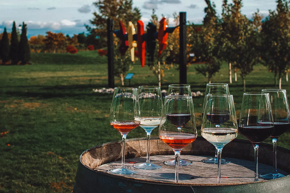 Glasses of wine on a barrel outside