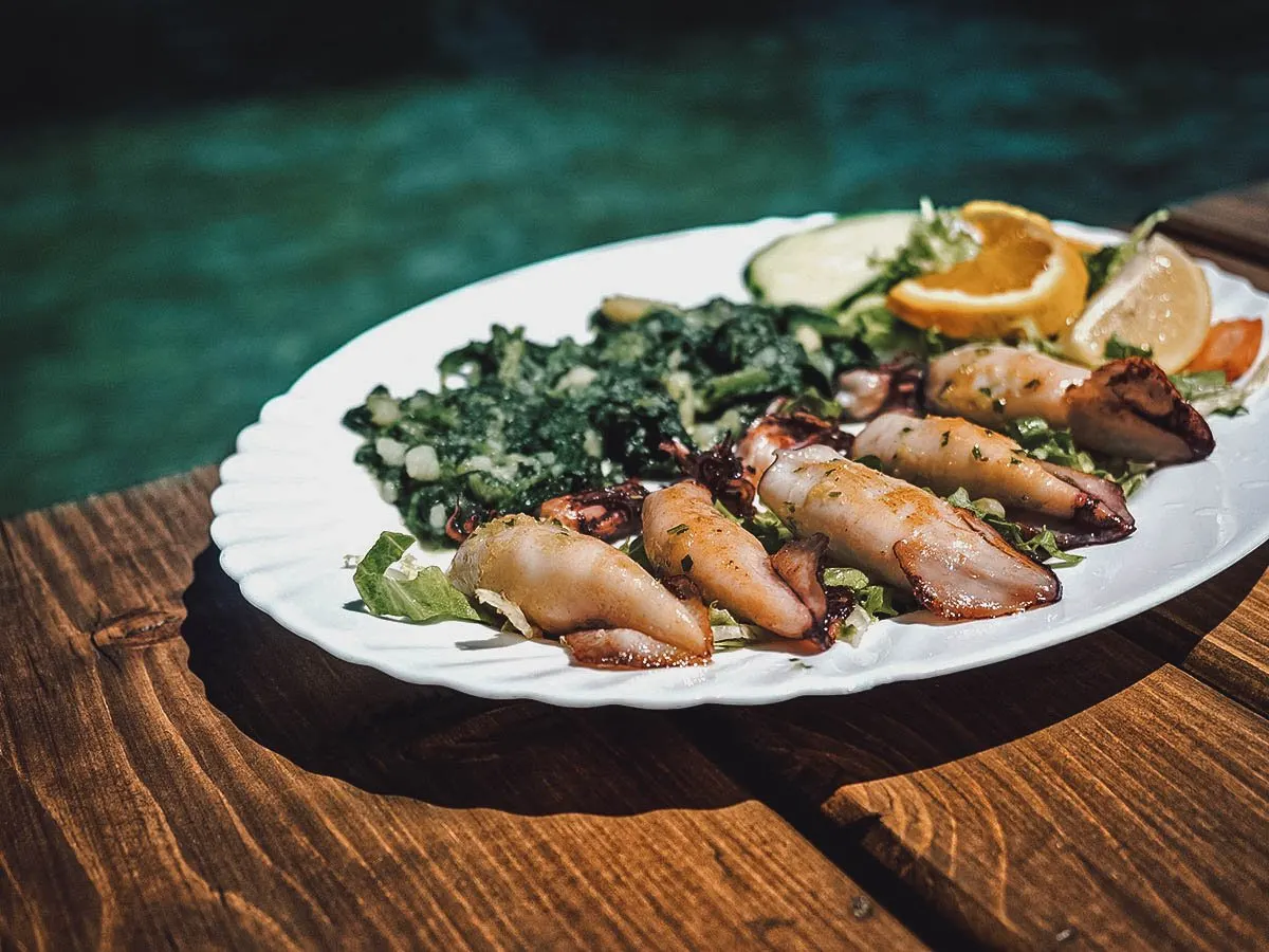 Croatian Food Grilled Adriatic squid, typical Croatian food along the coast