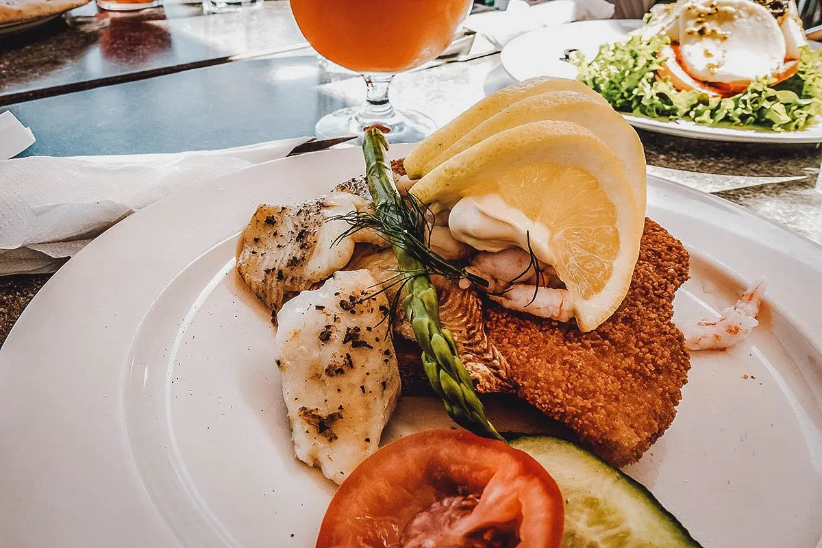 Stjerneskud, a typical Danish dish made with a fried fish fillet, shrimp, and caviar on buttered bread