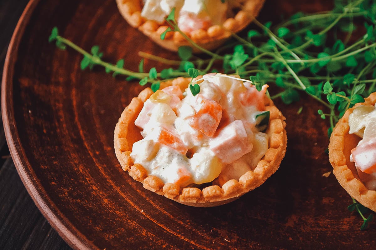 Tarteletter, a traditional dish made with chicken, asparagus, potato salad, mashed potatoes, etc