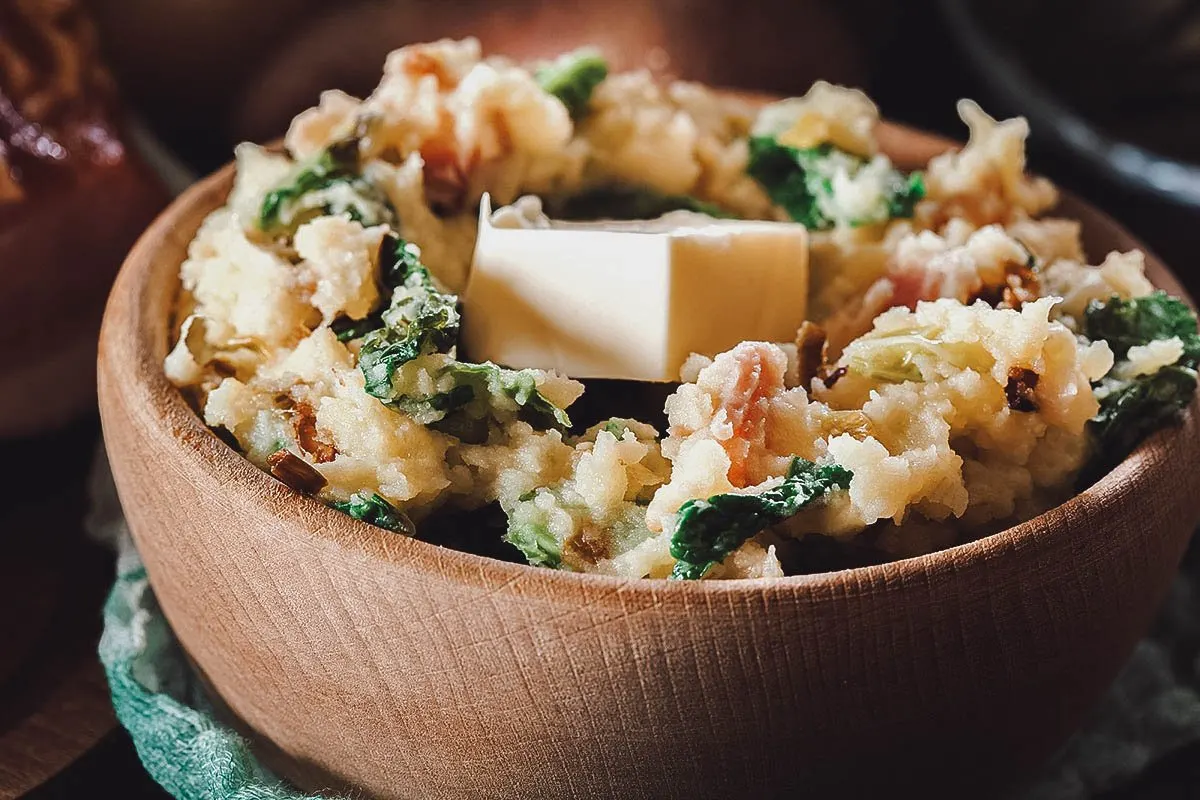 Colcannon, a popular Irish dish made with creamy mashed potatoes and melted butter