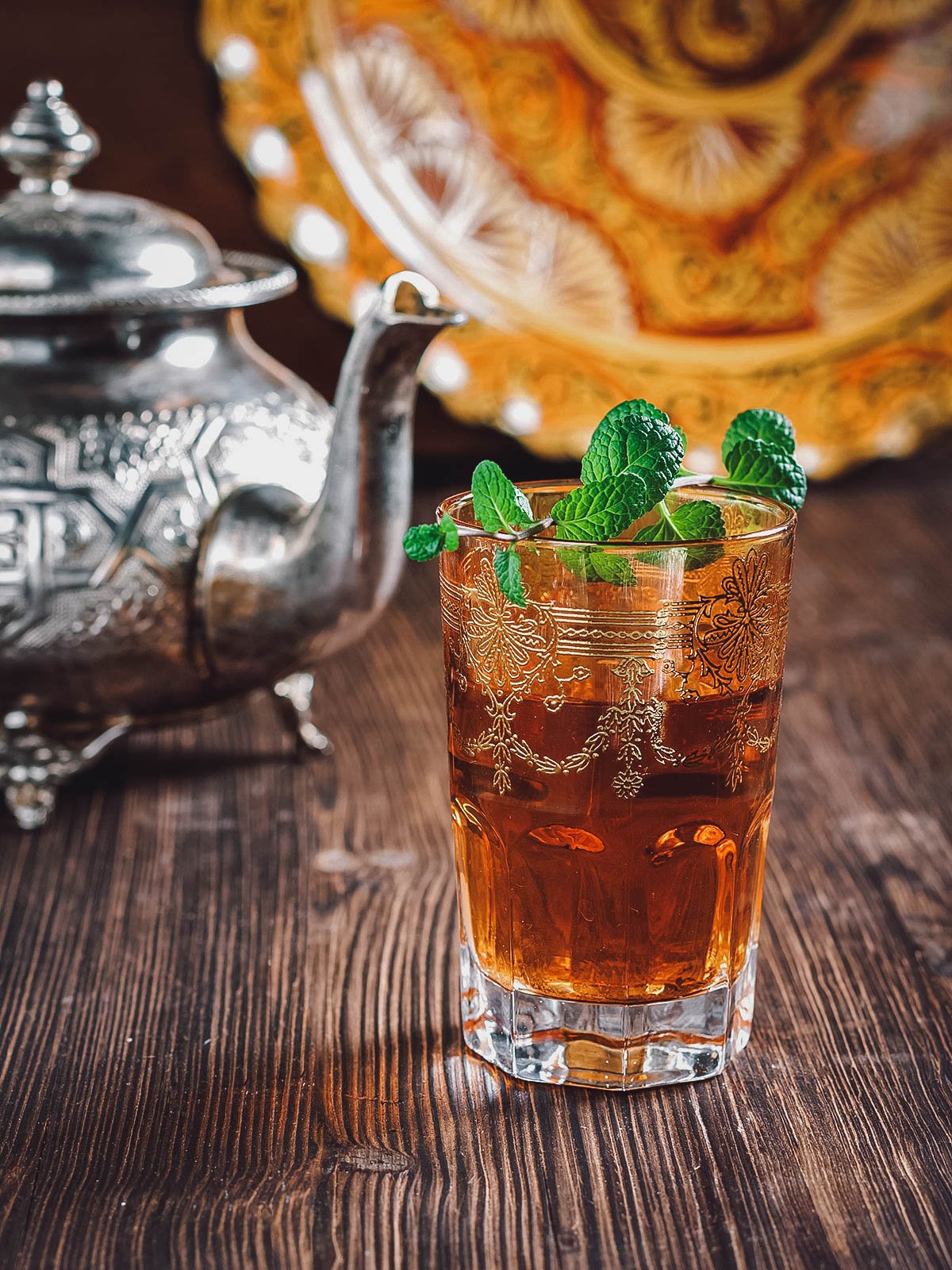 Glass of tea with mint leaves