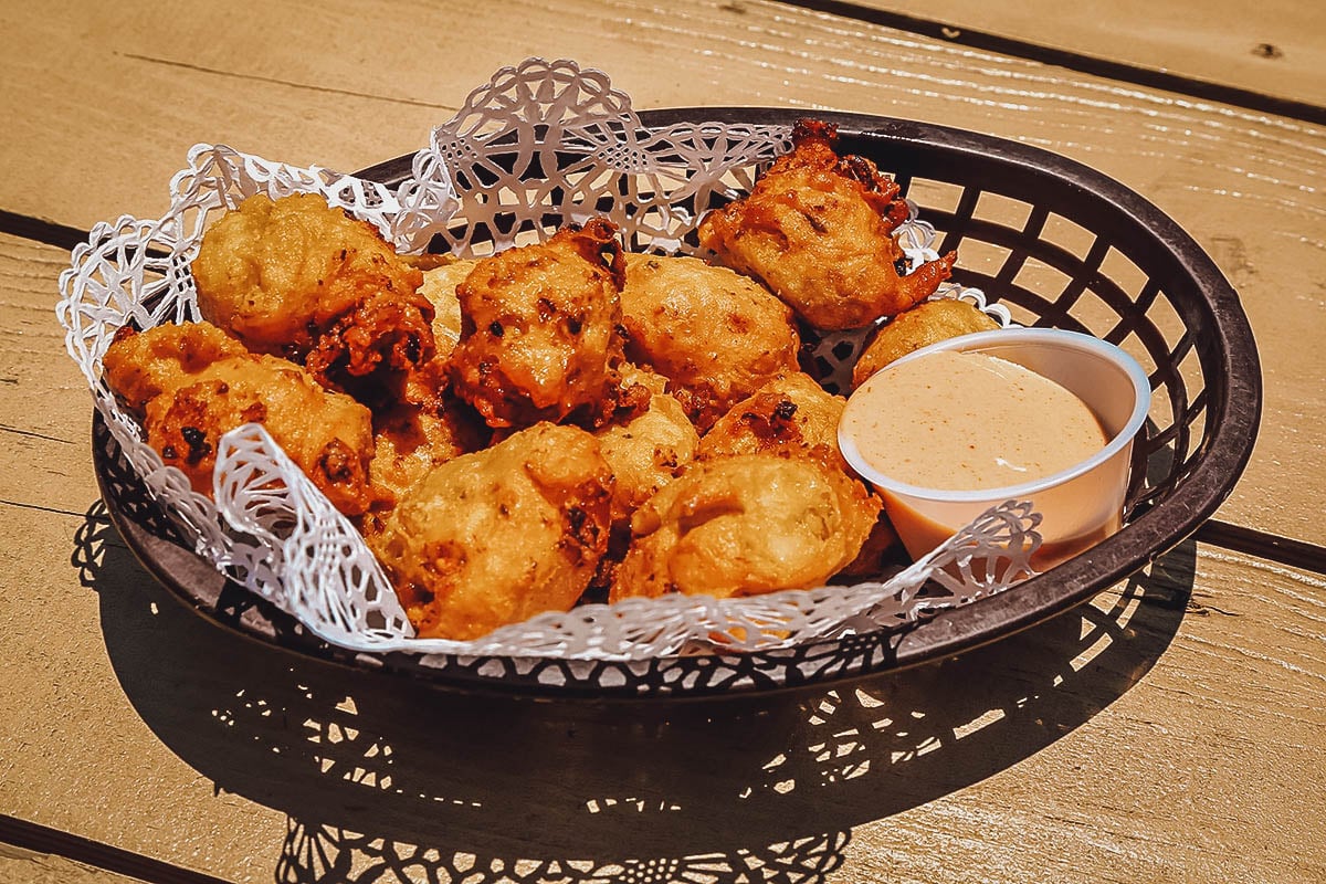 Conch fritters, a popular Bahamian snack or side dish made with conch meat and bell peppers