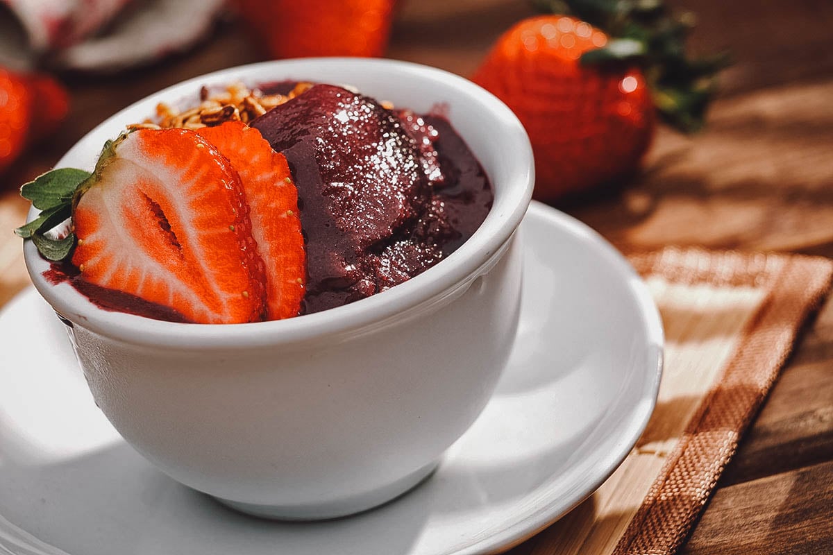 Acai bowl with sliced strawberries and acai berries, an indigenous fruit in Brazil