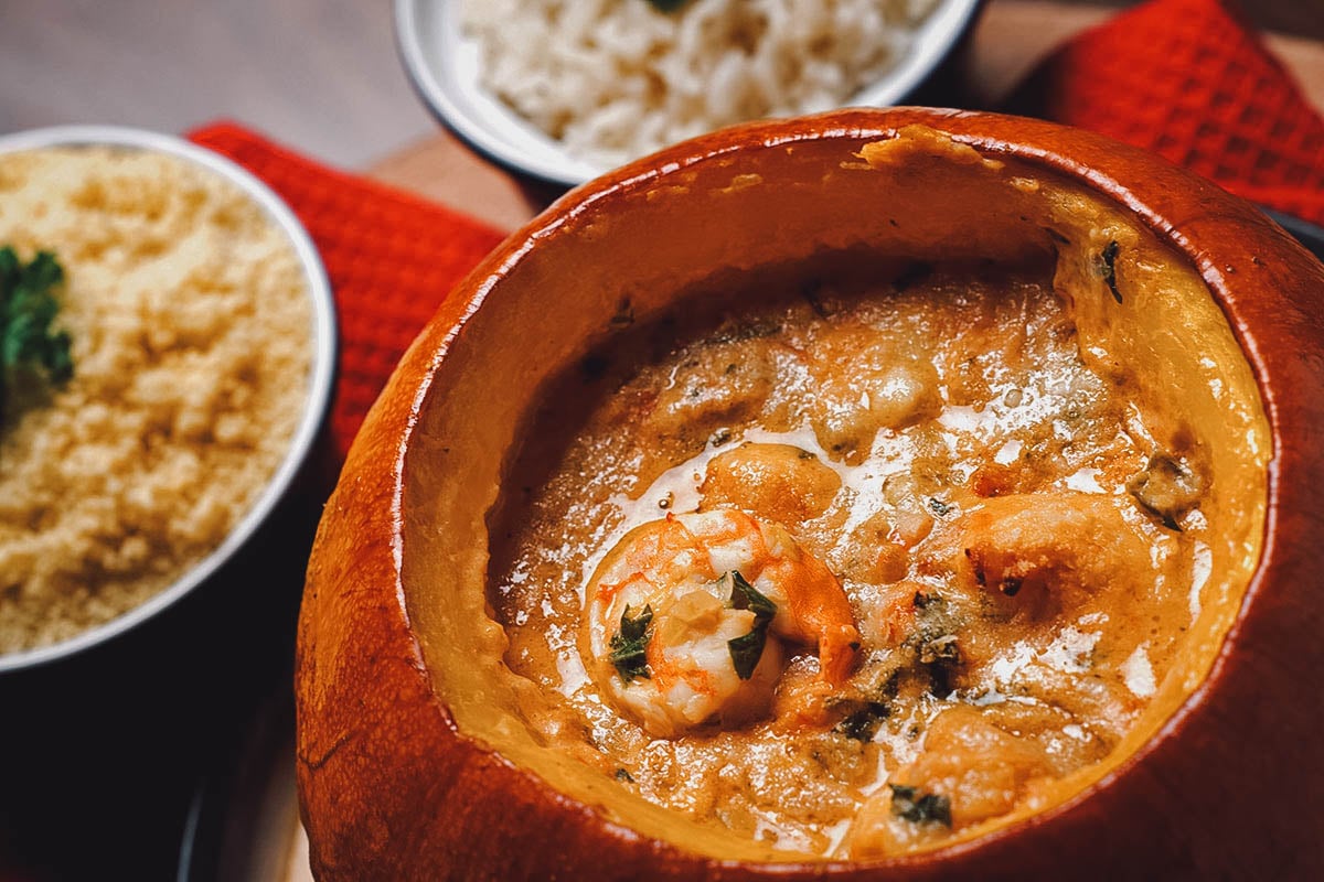 Camarao na moranga, a Brazilian shrimp stew made with a thick broth served in a pumpkin