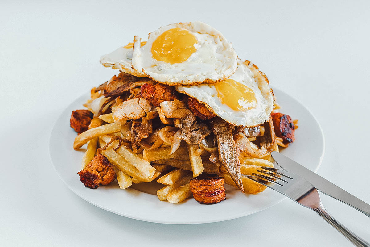 Chorrillana topped with fried egg