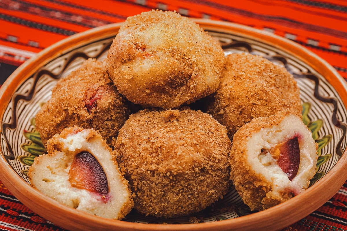 Hungarian szilvas gomboc or plum dumplings