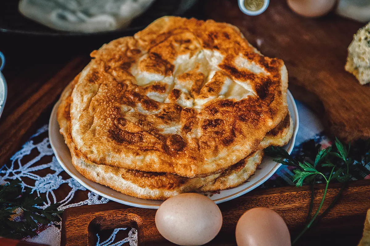 Romanian Food Placinta, a Romanian flatbread filled with sweet or savory ingredients