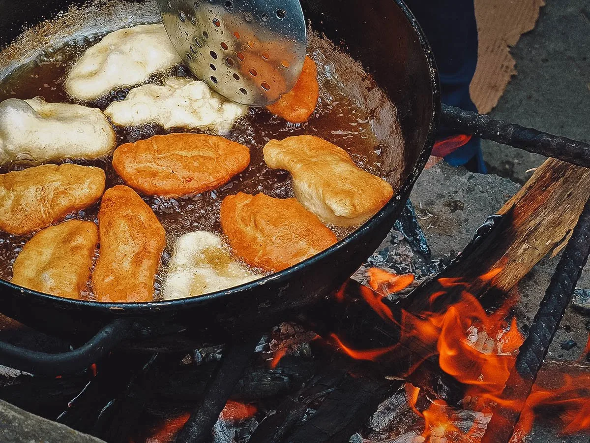 Ecuadorian Food Ecuadorian empanadas deep-frying in a pot