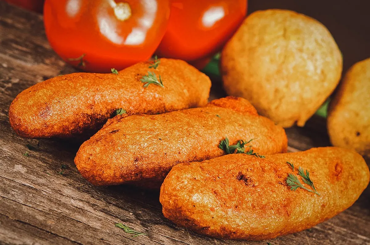 Ecuadorian Food Muchines de yuca, deep-fried Ecuadorian yuca fritters