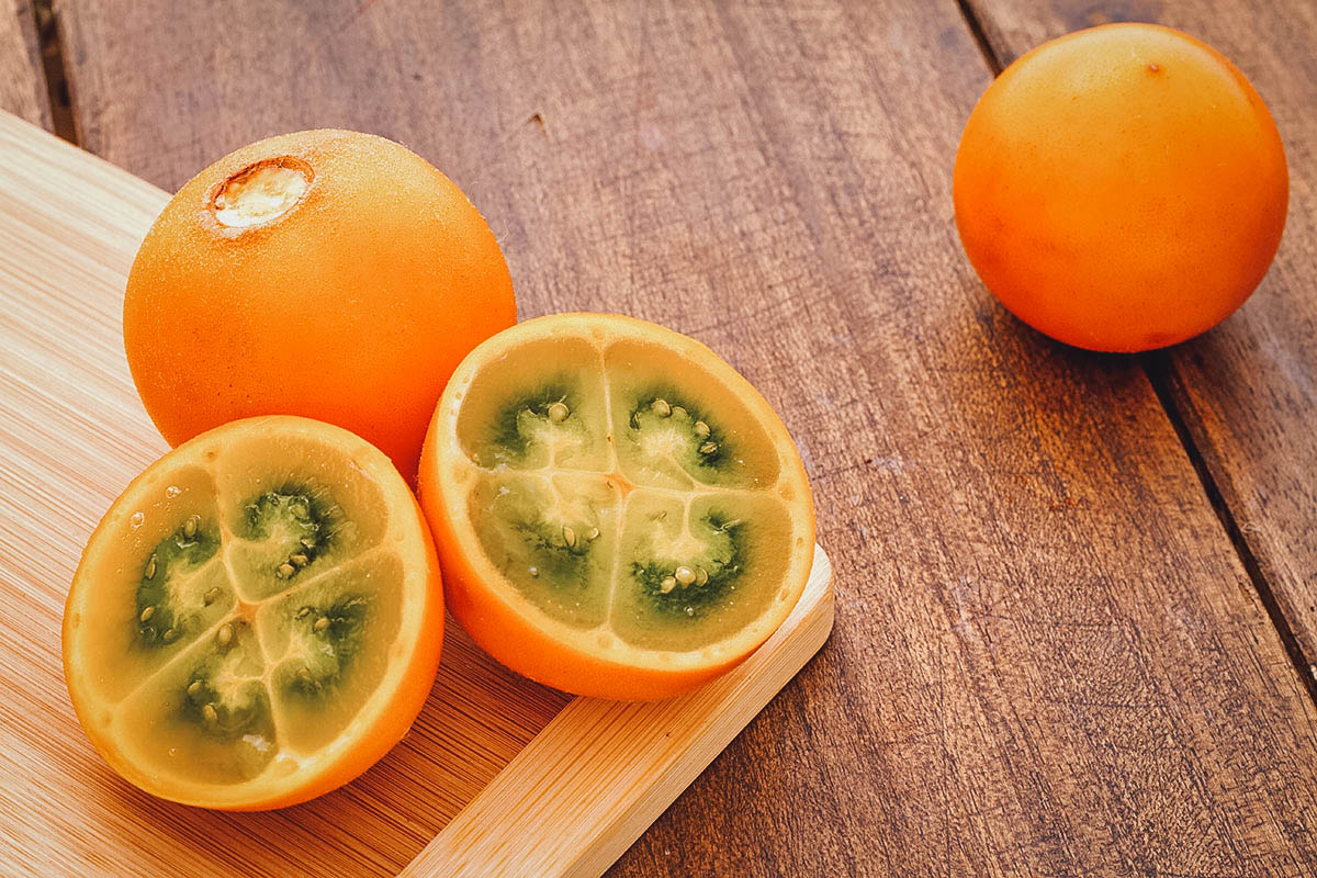 Bunch of naranjilla, an acidic fruit often used in Ecuadorian cooking