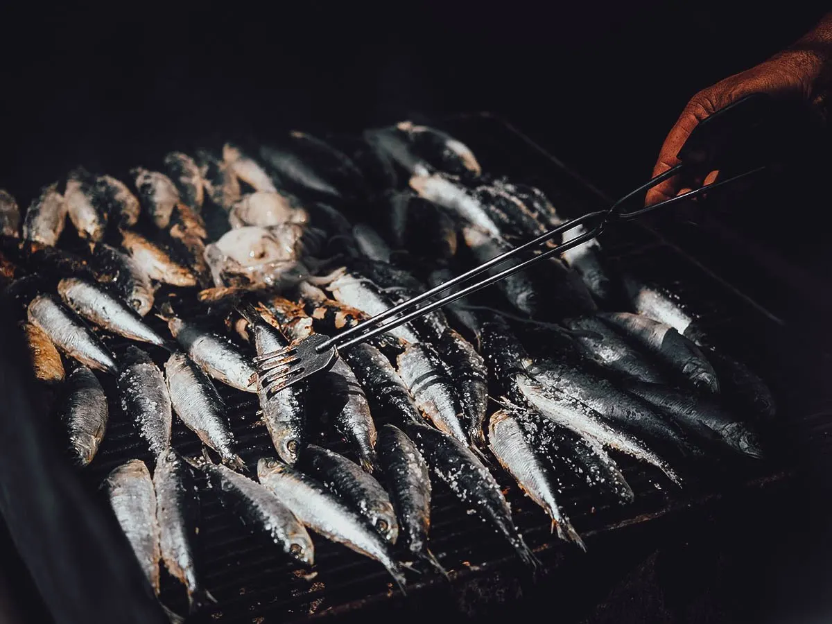 Grilling sardines in Lisbon, Portugal