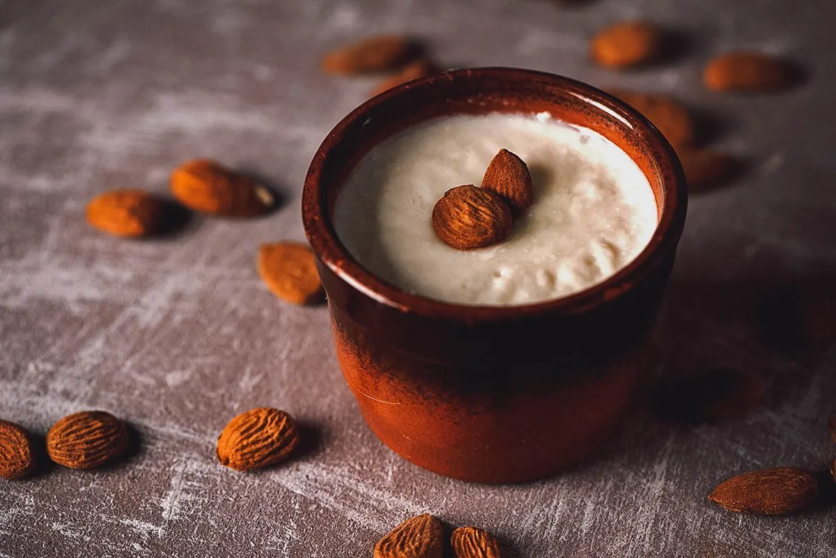 Spanish Desserts Cup of menjar blanc, a dessert made with almond milk and rice flour