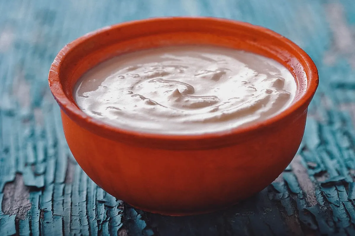 Bulgarian Food Clay pot with kiselo mlyako, a traditional Bulgarian yogurt