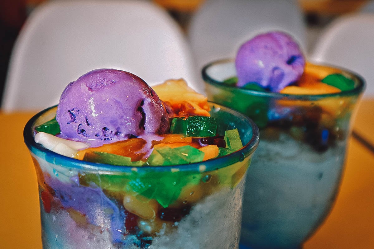 Glasses of halo-halo, a dessert made with shaved ice, sweetened condensed milk, leche flan, ube, etc