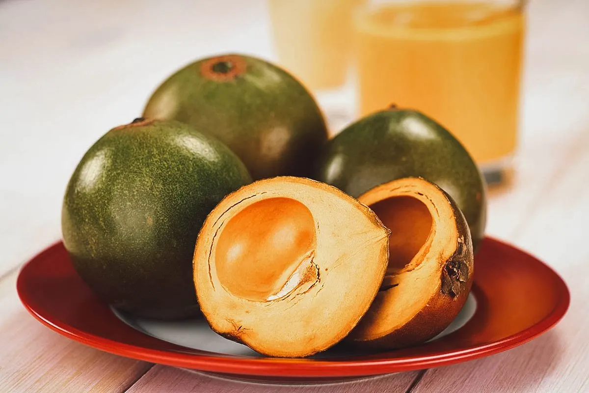 Peruvian Desserts Peruvian lucuma fruits on a plate