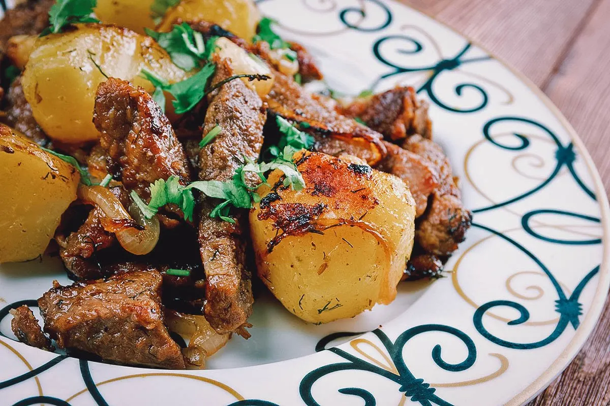 Kazan kebab, a traditional Uzbek dish cooked in a deep pan called a kazan