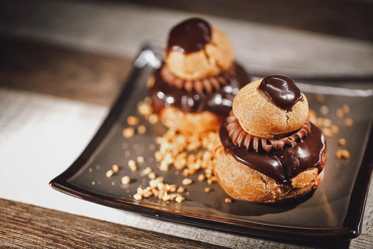 Religieuse, a French dessert consisting of two choux pastry puffs