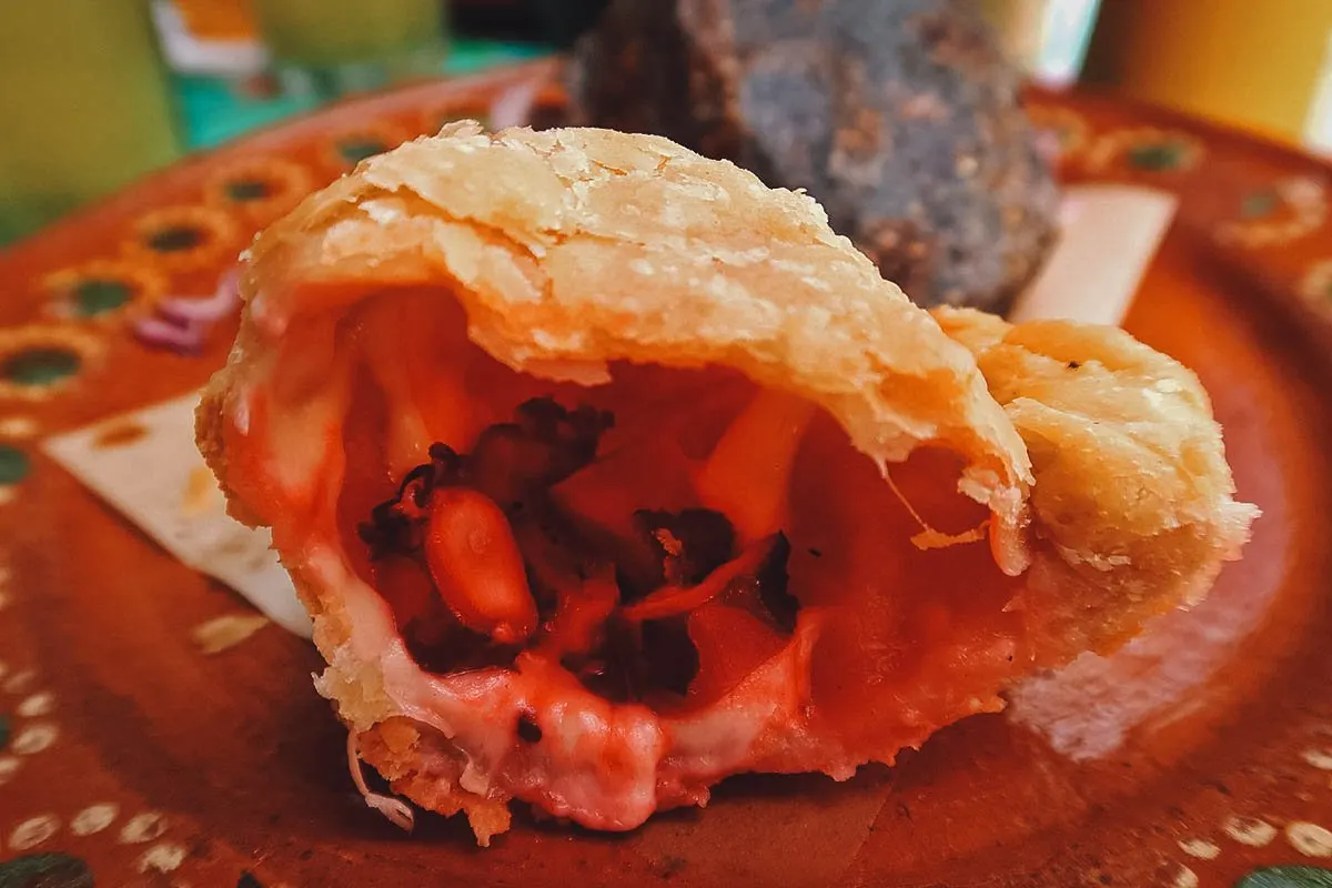 An inside look at the filling of the octopus empanada