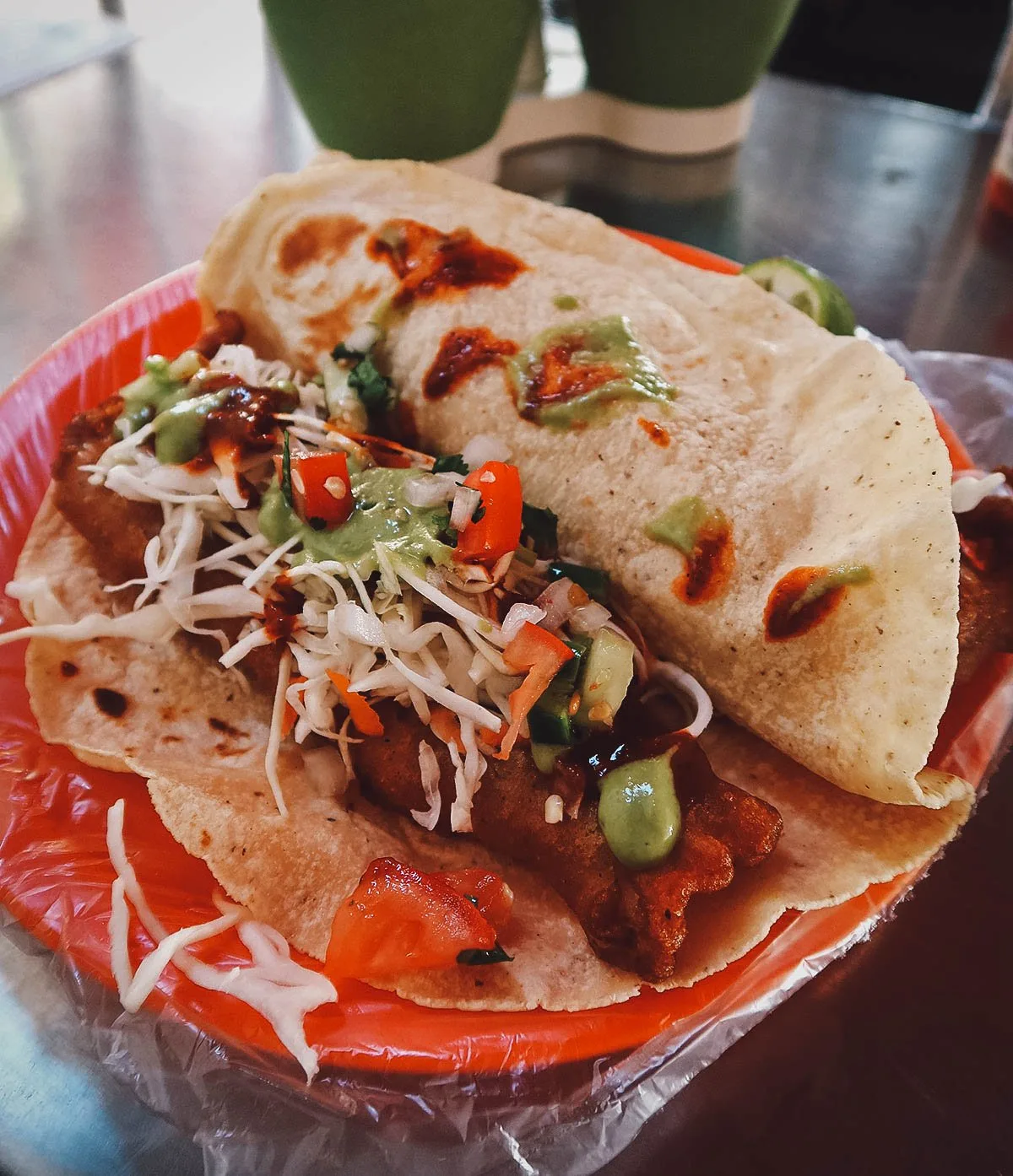 Shrimp and fish tacos with salsa verde in Puerto Vallarta