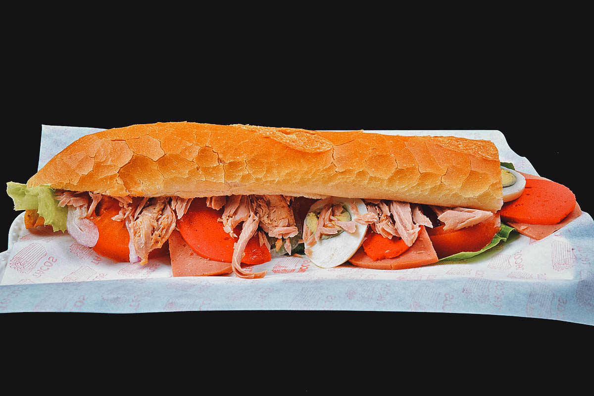 Tunisian Food Fricassee, a Tunisian fried sandwich made with tuna, hummus, and boiled egg
