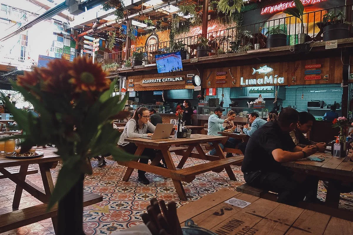 The Best Food in Mexico City Dining area at Comedor de Los Milagros food hall in Mexico City