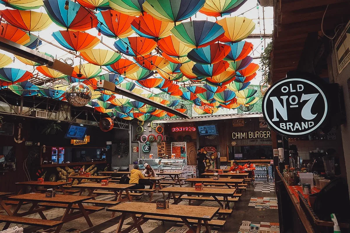 Dining area inside Comedor Lucerna food hall in Mexico City