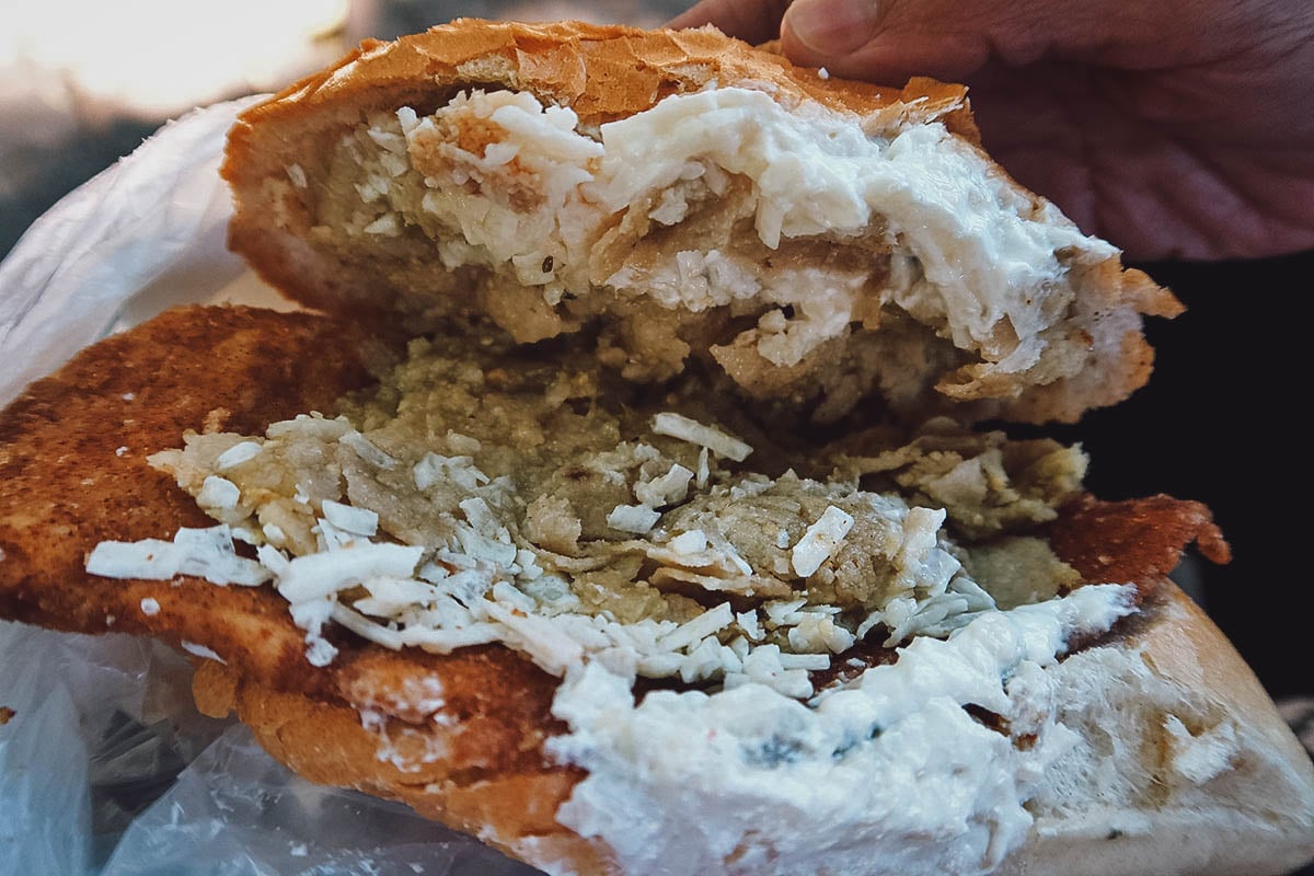 Torta de chilaquiles fillings from a street food stand in Mexico City