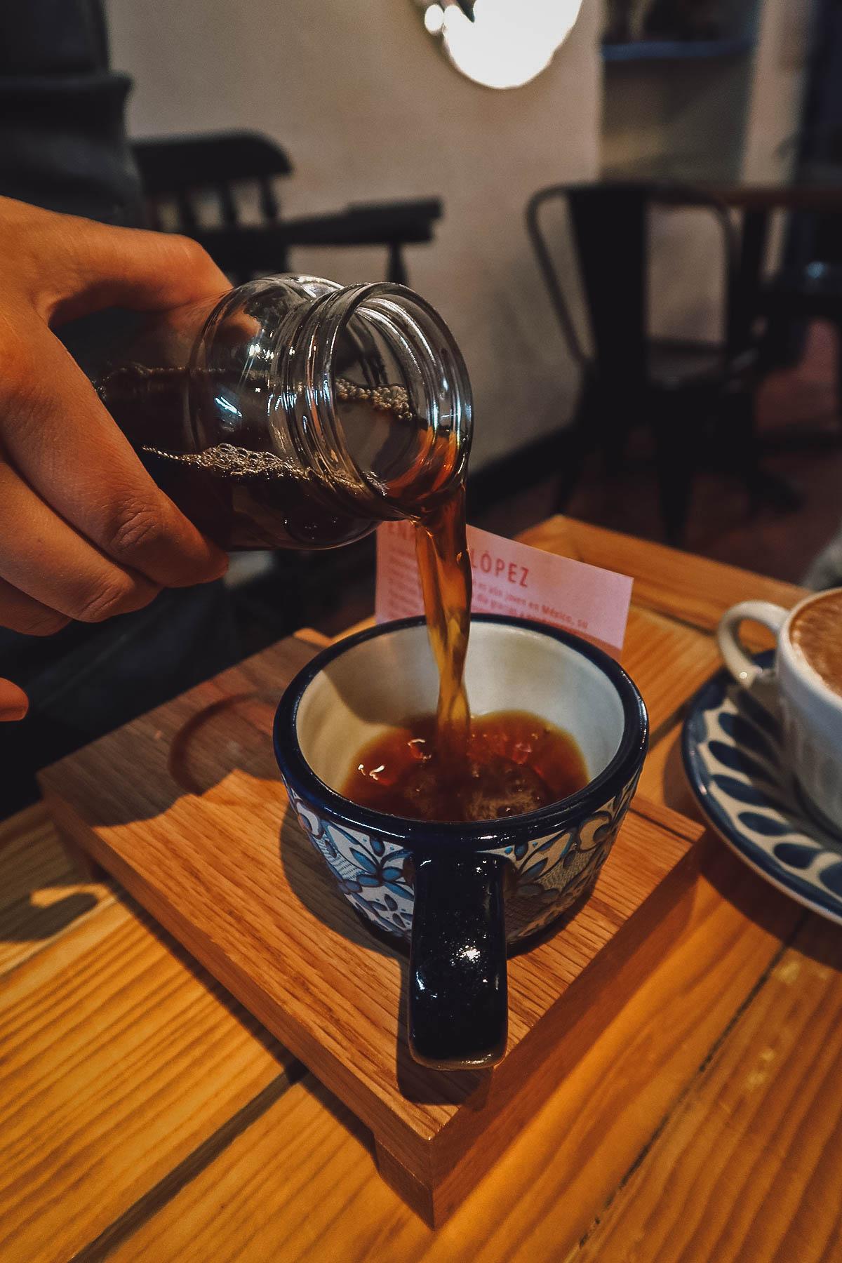 Pouring black coffee at Lavanda Cafe