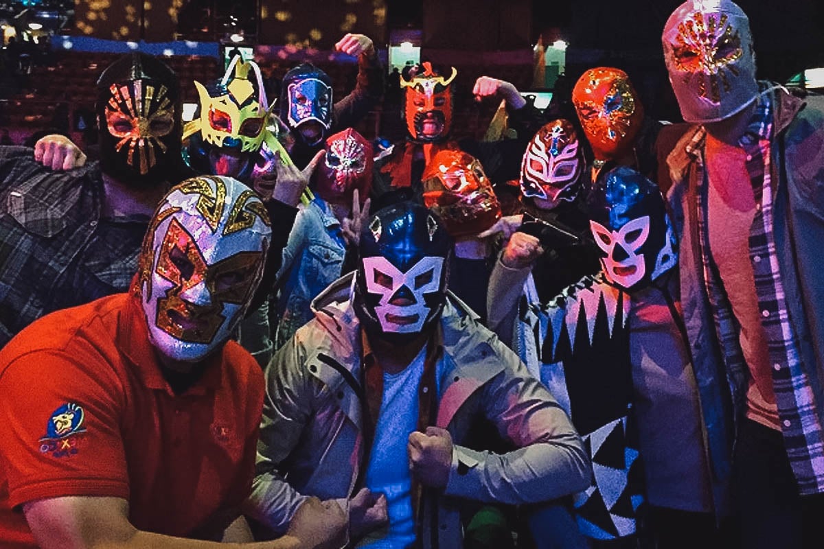 Tourists wearing luchador masks in Mexico City
