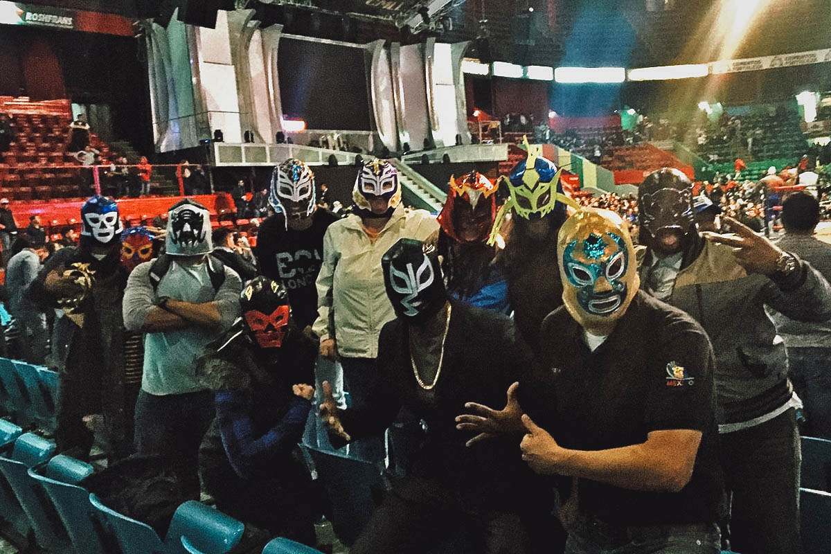 Tourists wearing luchador masks at an arena in Mexico City