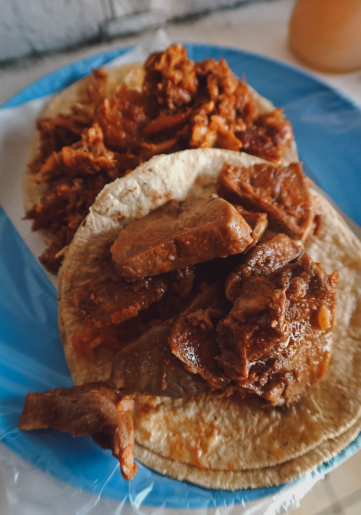 Lengua and chicharron guisado