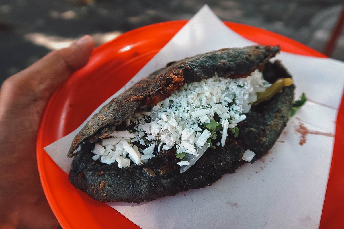 Tlacoyo from a street food stall in Mexico City