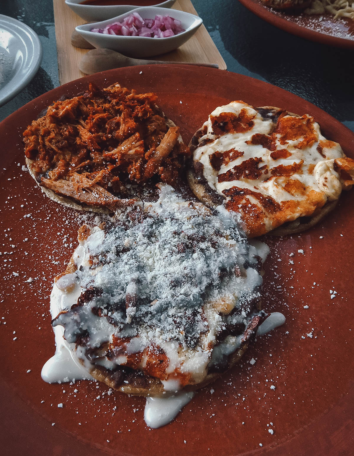 Trio of assorted gorditas at El Son Istmeno restaurant in Oaxaca City