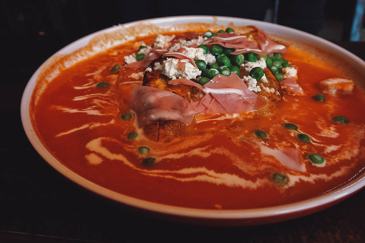 Huevos motuleños at a restaurant in Oaxaca City