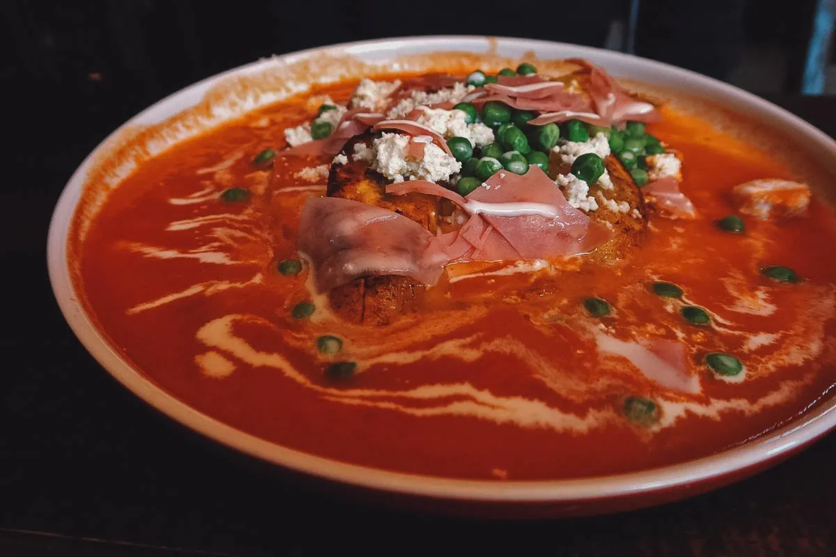 Huevos motuleños at a restaurant in Oaxaca City