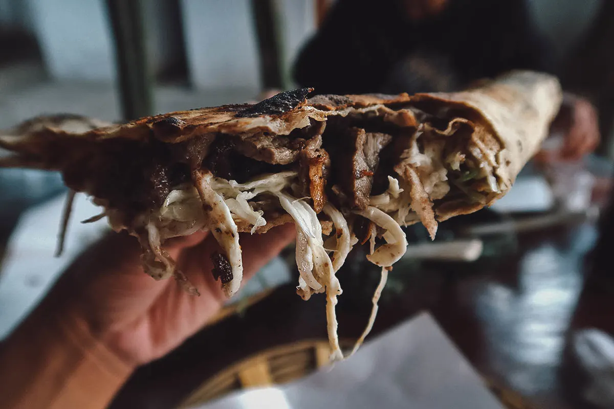Oaxacan Food Tlayuda with Oaxacan string cheese and tasajo