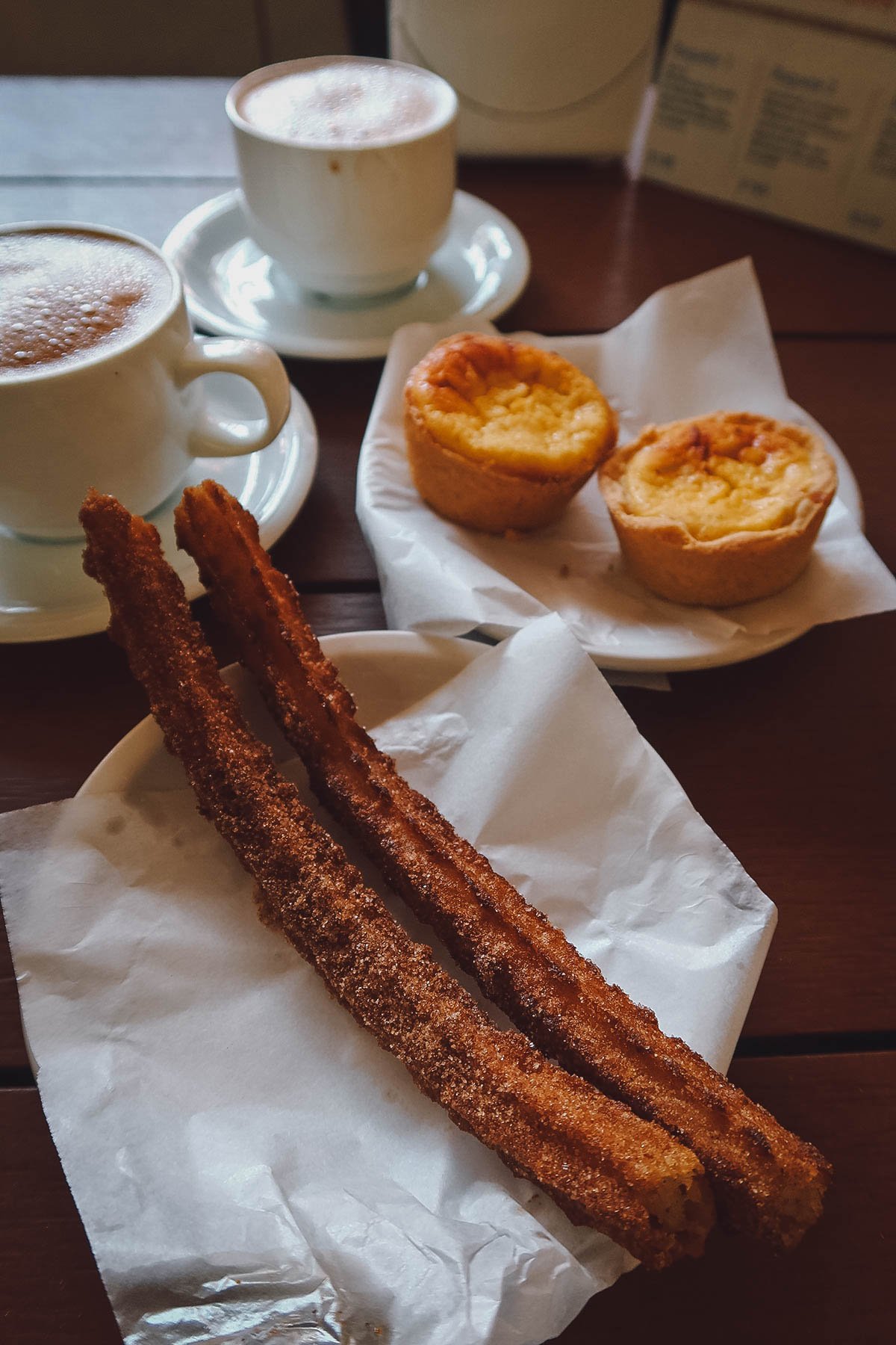 Churros, cubiletes, and hot chocolate
