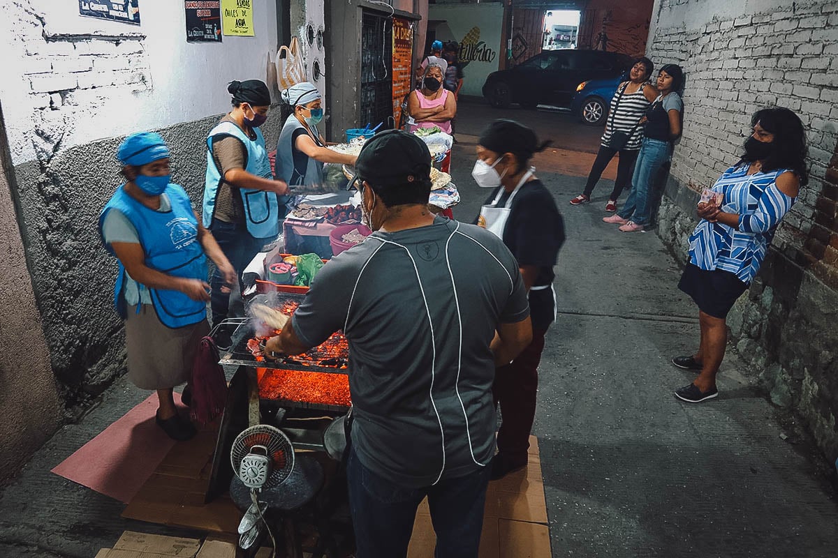 Customers around Tlayudas La Chinita stall