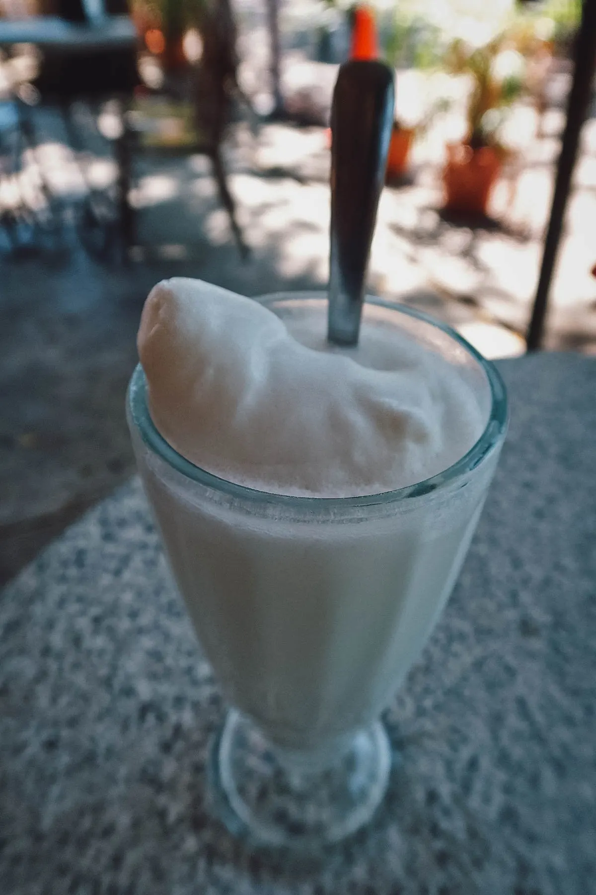 Coconut champola at a restaurant in Merida, Mexico