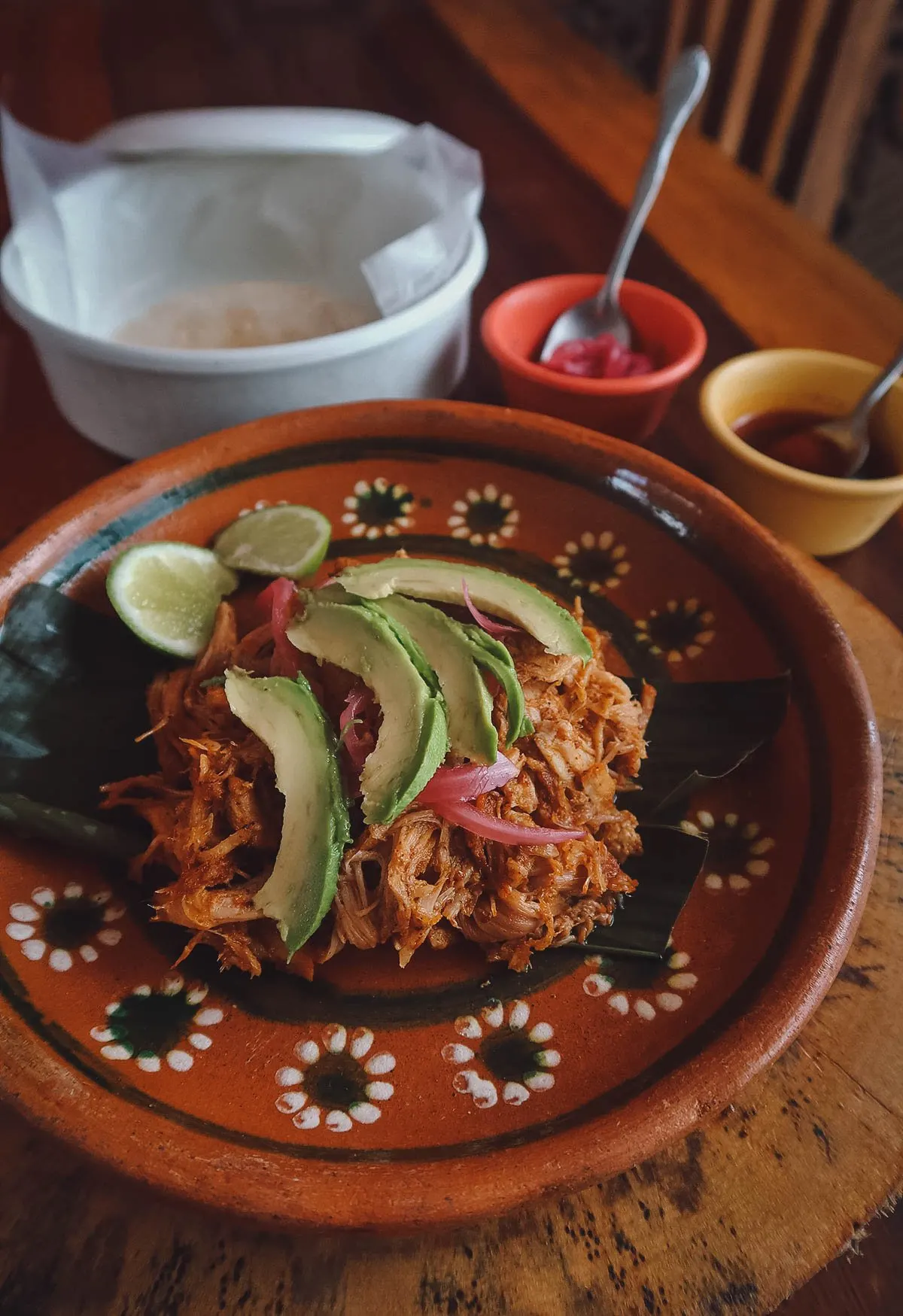Cochinita pibil on beautiful Mexican dining ware