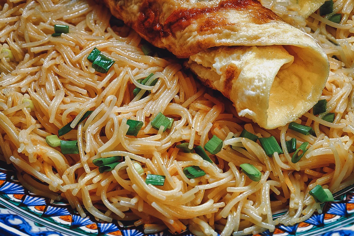 Balaleet, savory-sweet noodles topped with scrambled eggs