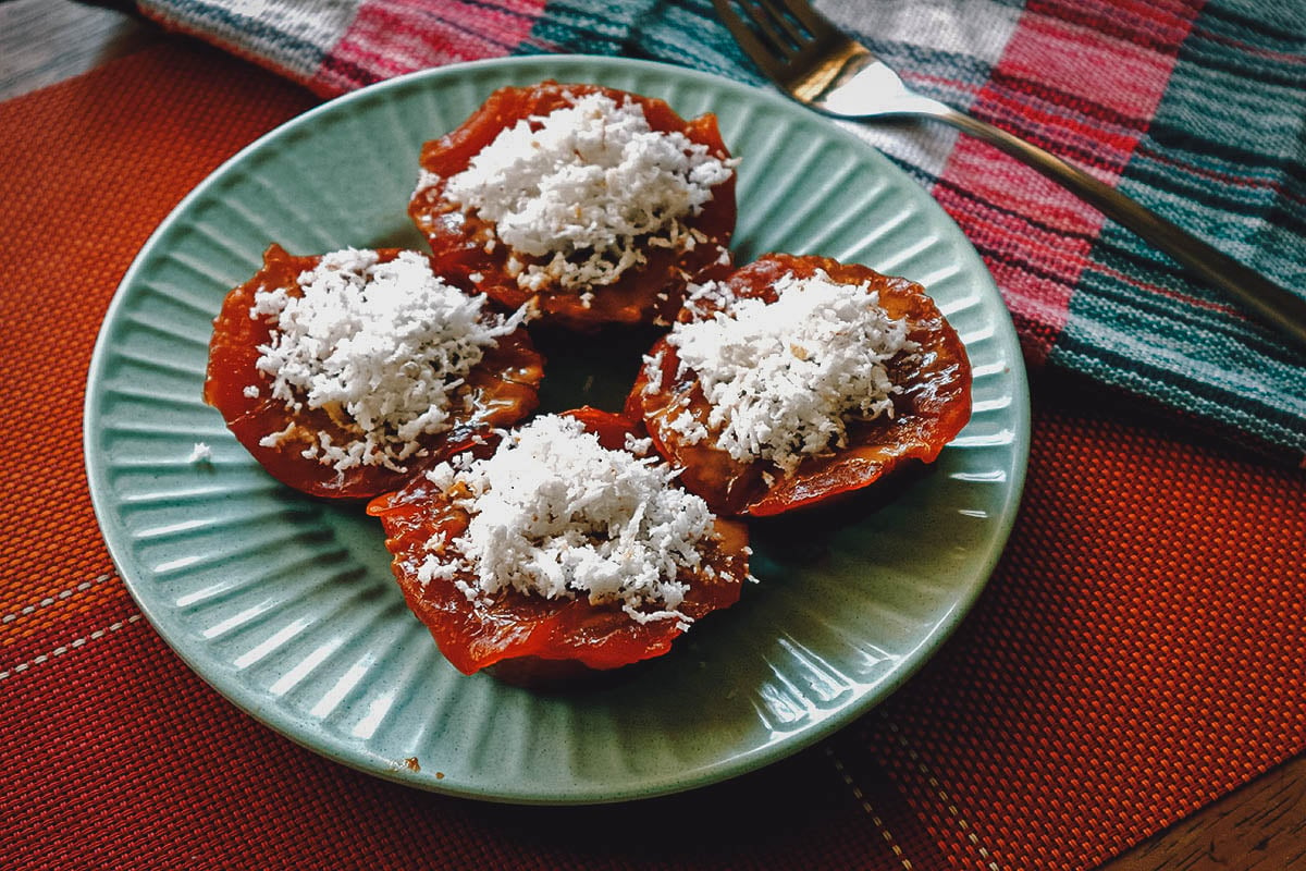 Kutsinta rice cakes topped with shaved coconut