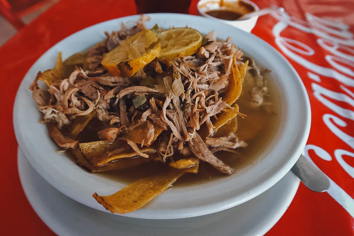 Soup with turkey, lime, and fried corn tortillas