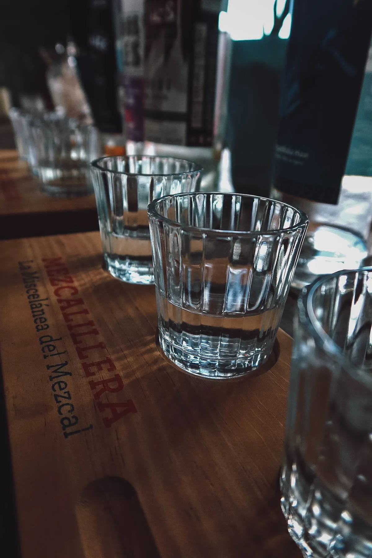 The Best Mezcalerias in Oaxaca Tasting glasses at a mezcaleria